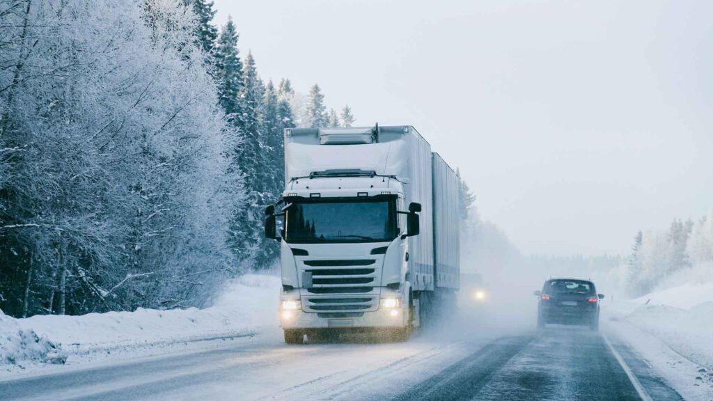 Truck is on Snowy road